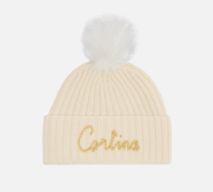 Berretto Wengen W F con pompon bianco