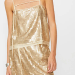 Isabelle Blanche top in paillettes oro