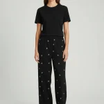 Apaperkid Pantalone nero con applicazioni