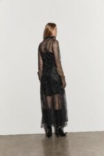 ABITO NERO IN PIZZO